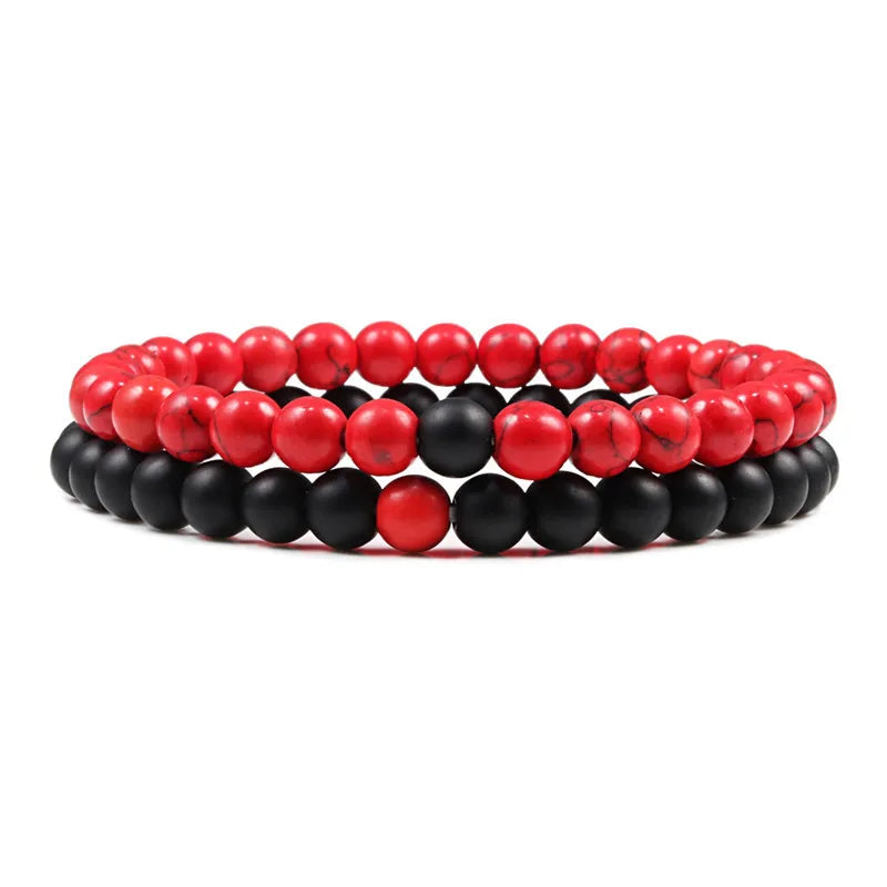 Duo de bracelets Passion en pierre naturelle rouge et noire, symbole de force et d’émotion intense.