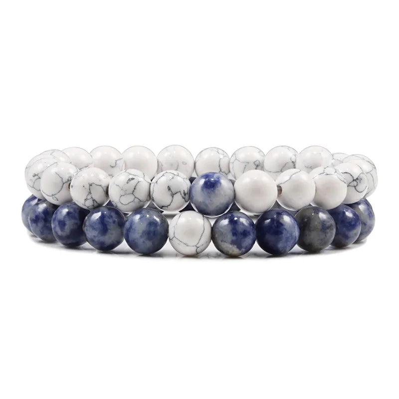 Duo de bracelets Céleste en pierre naturelle bleue et blanche, symbole de sérénité et d’élégance.