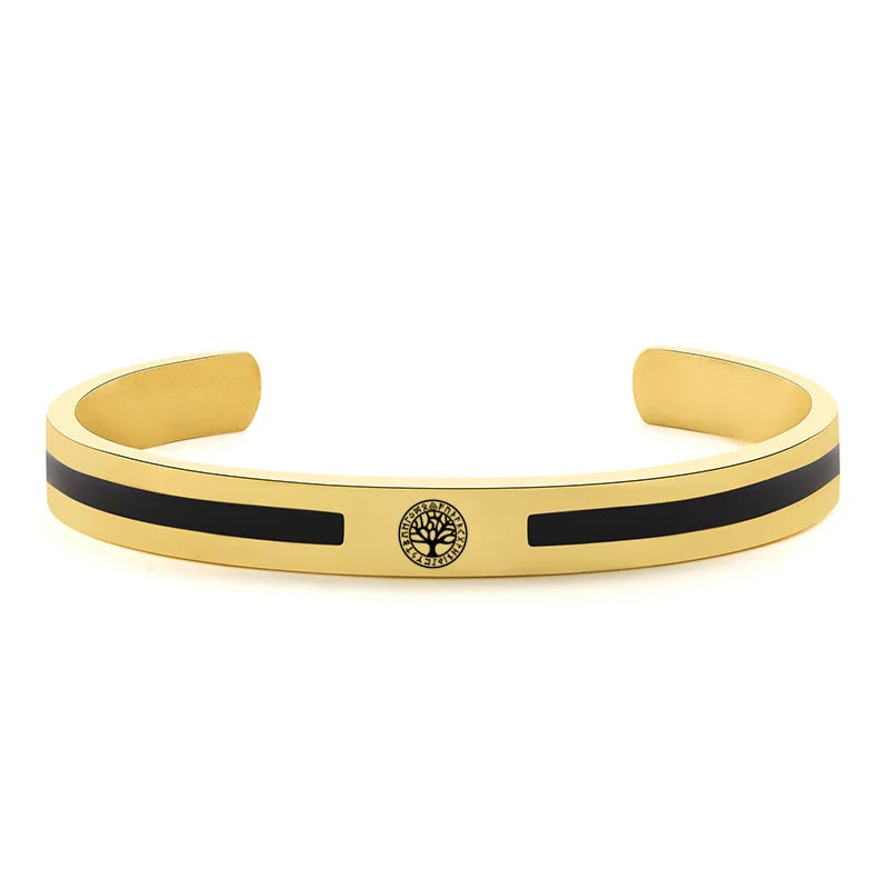 Bracelet homme Caïkos doré en acier inoxydable, avec gravure de l’Arbre de Vie, bijou élégant et intemporel.