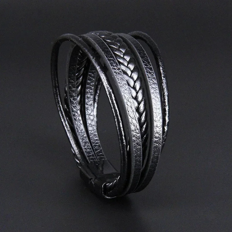 Bracelet homme Héraclès en cuir noir, accessoire masculin sophistiqué et intemporel.