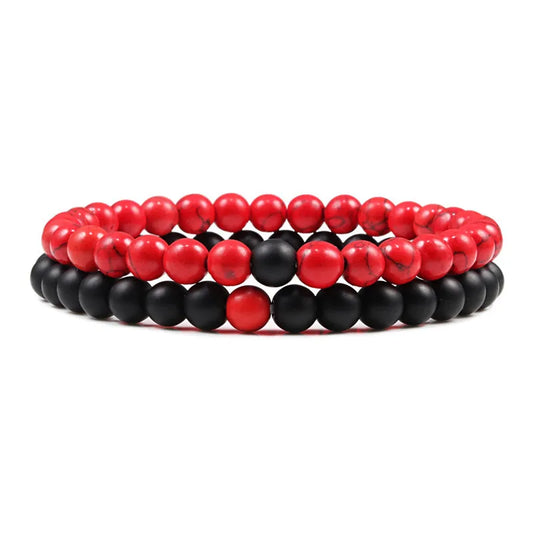 Duo de bracelets Passion en pierre naturelle rouge et noire, symbole de force et d’émotion intense.