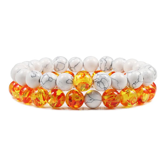 Duo de bracelets Lumineux en pierre naturelle ambre et blanche, symbole d’énergie et de sérénité.