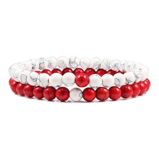 Duo de bracelets Audace en pierre naturelle rouge et blanche, symbole de passion et de pureté.
