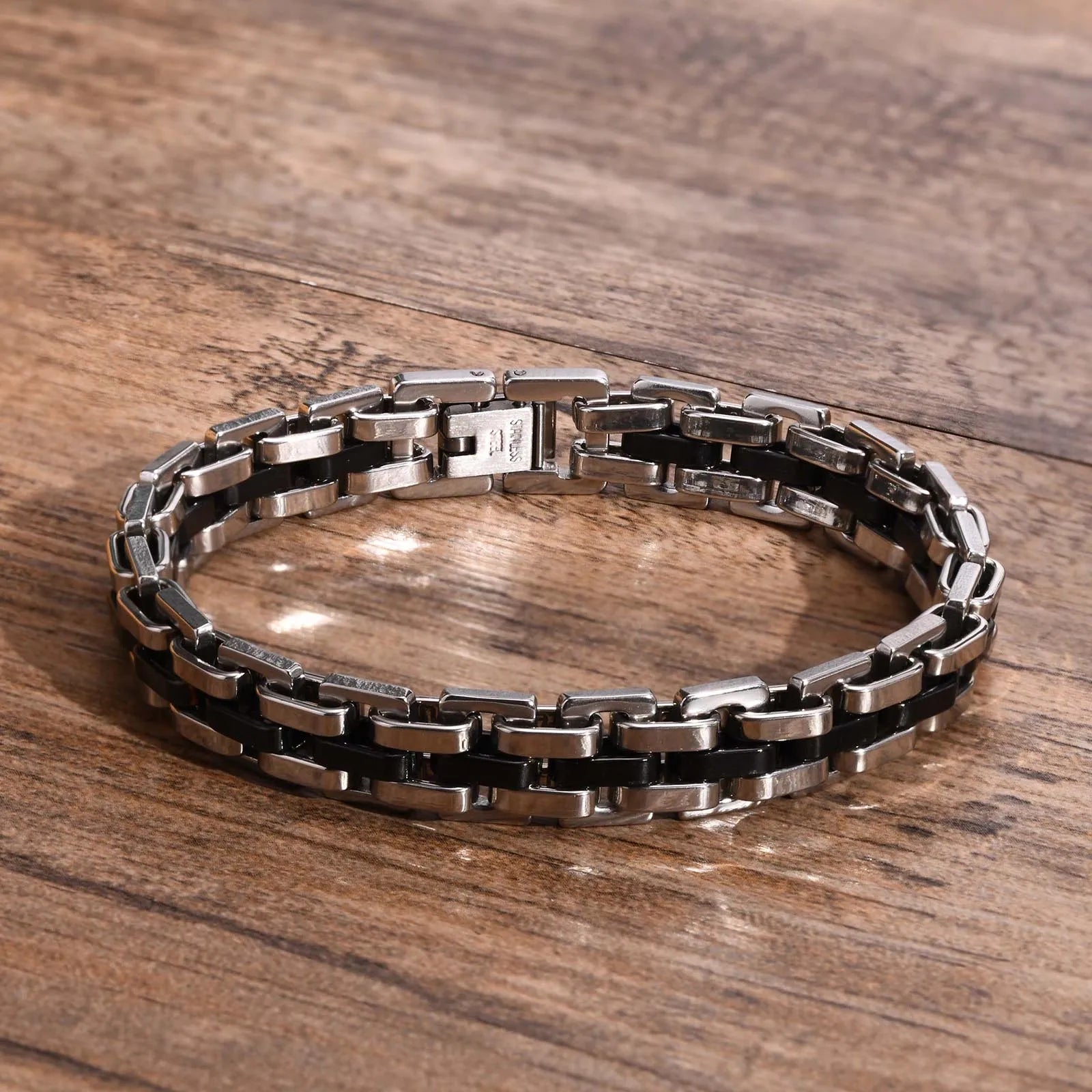 Bracelet Pégase en acier inoxydable argenté et noir, bijou robuste et intemporel.