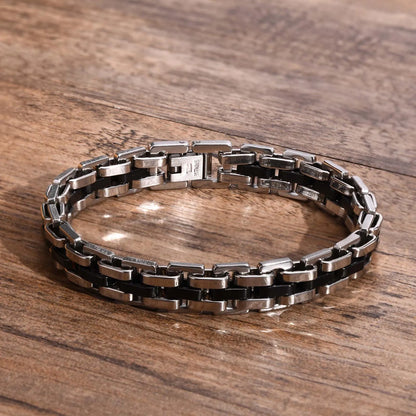 Bracelet Pégase en acier inoxydable argenté et noir, bijou robuste et intemporel.