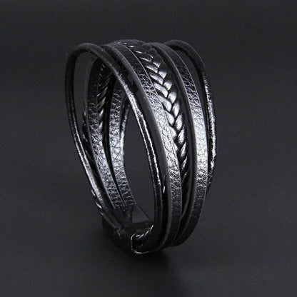 Bracelet homme Héraclès en cuir noir, accessoire masculin sophistiqué et intemporel.