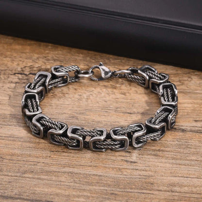 Bracelet homme Orion argenté mat en acier inoxydable, bijou sobre et moderne pour un style affirmé.