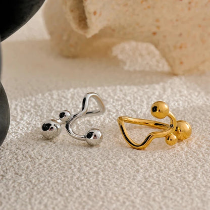 Bague femme Séléné en acier inoxydable doré et argenté, bijou minimaliste et élégant pour une touche intemporelle.